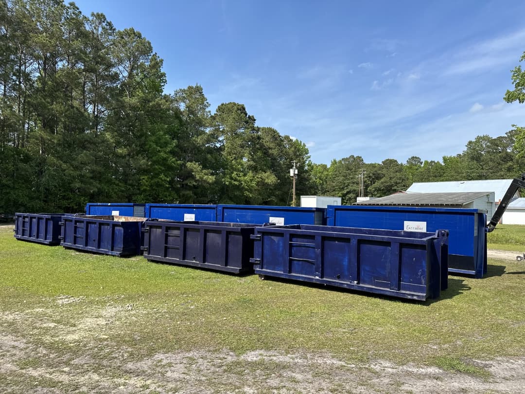 Red Dumpster in Driveway
